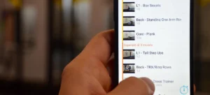 Vextrio App interface création programme et suivi progrès